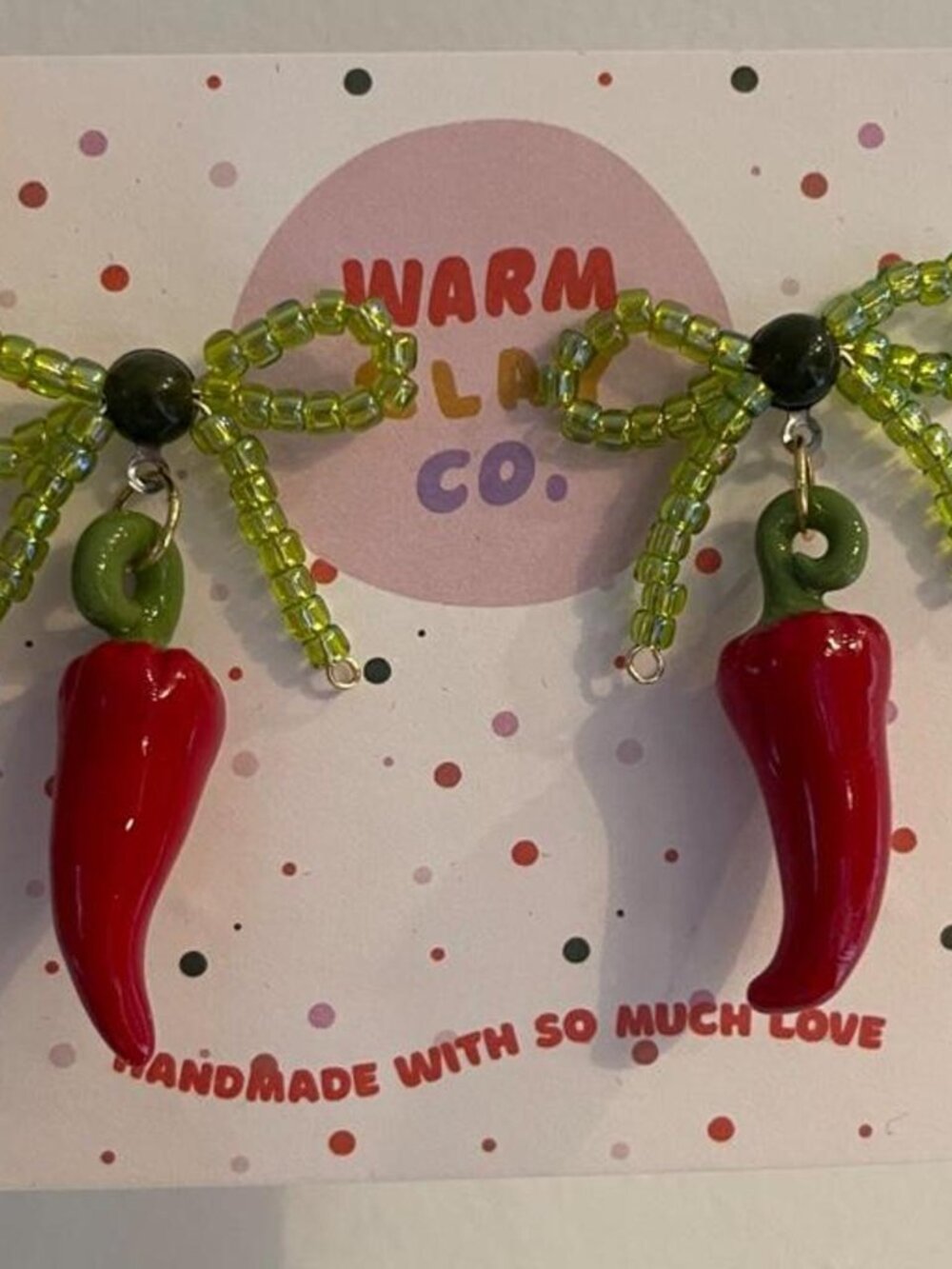 Warm Clay Co. red chili pepper earrings with green beaded bows #chili #handmade